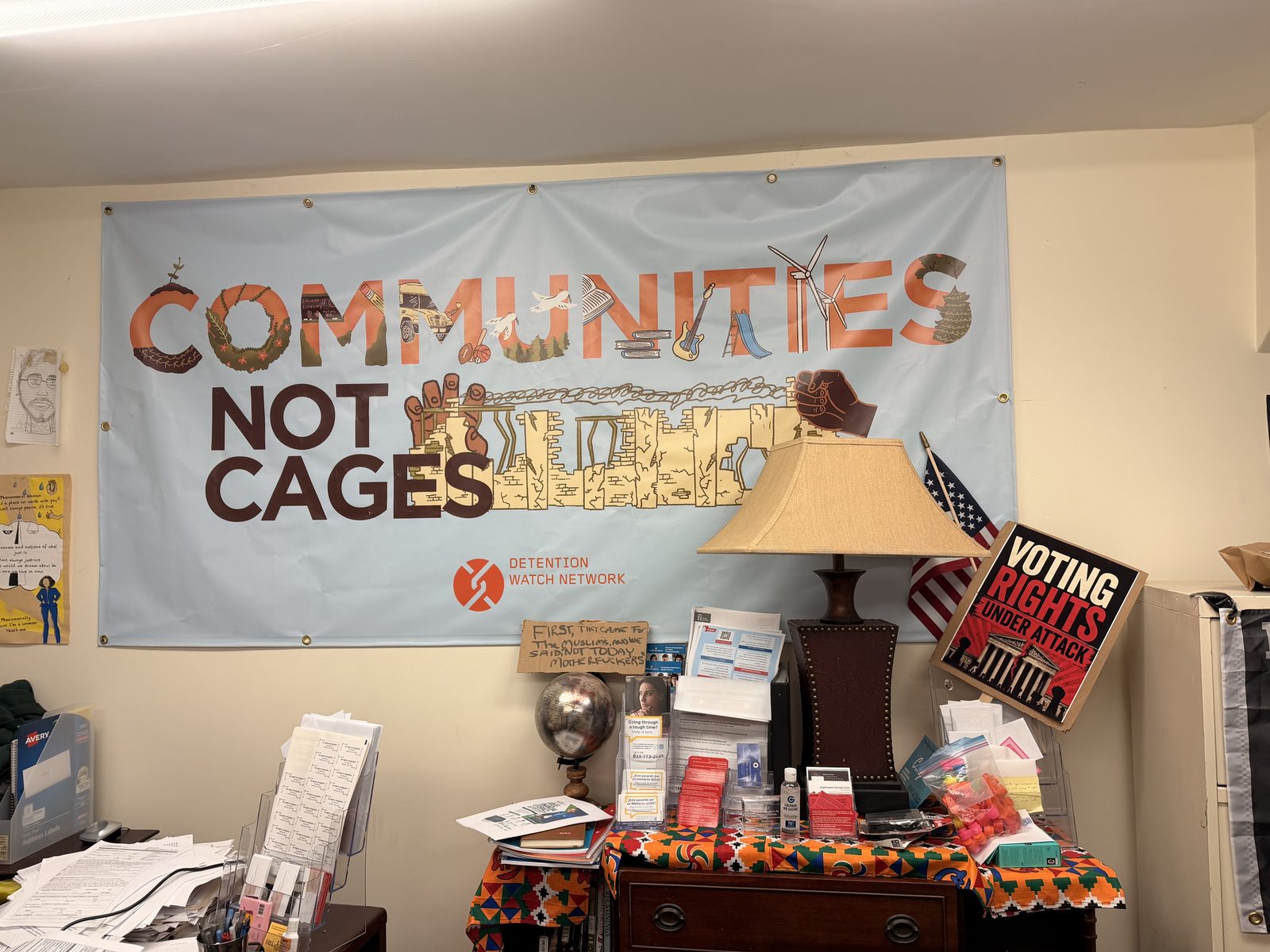 A Communities Not Cages banner above a table of community resources